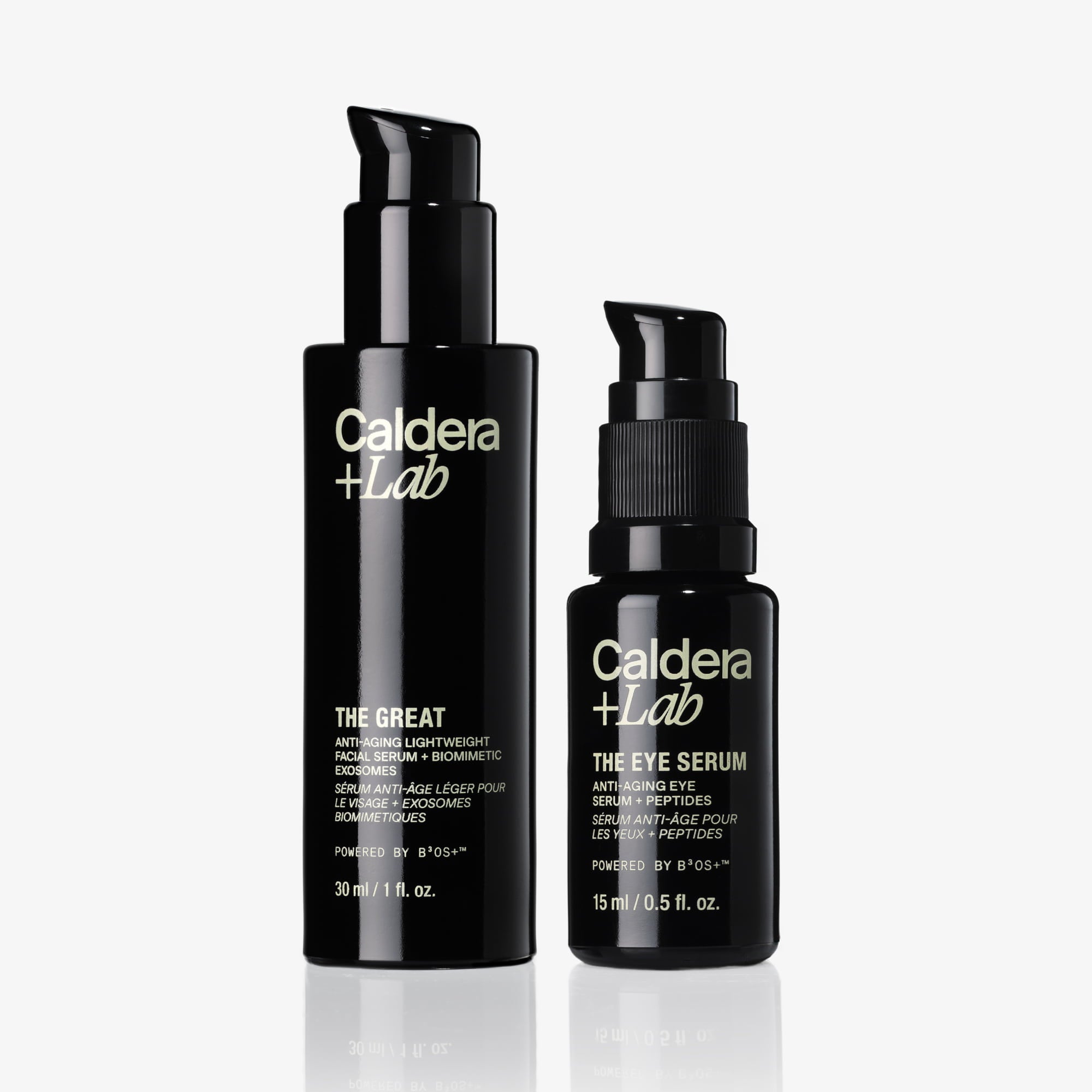 Two black bottles of Caldera Lab skincare products on a white background