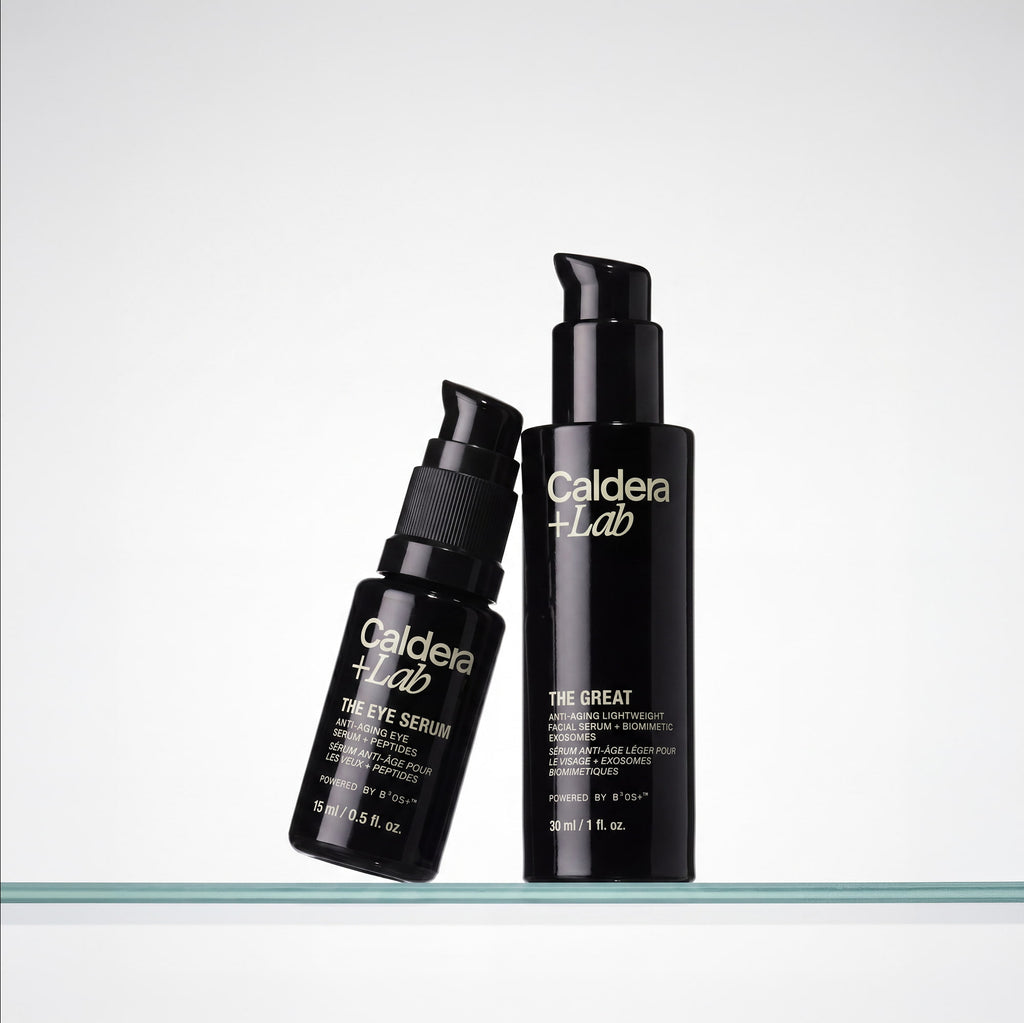 Two black bottles of Caldera+Lab skincare products on a white background