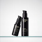 Two black bottles of Caldera+Lab skincare products on a white background