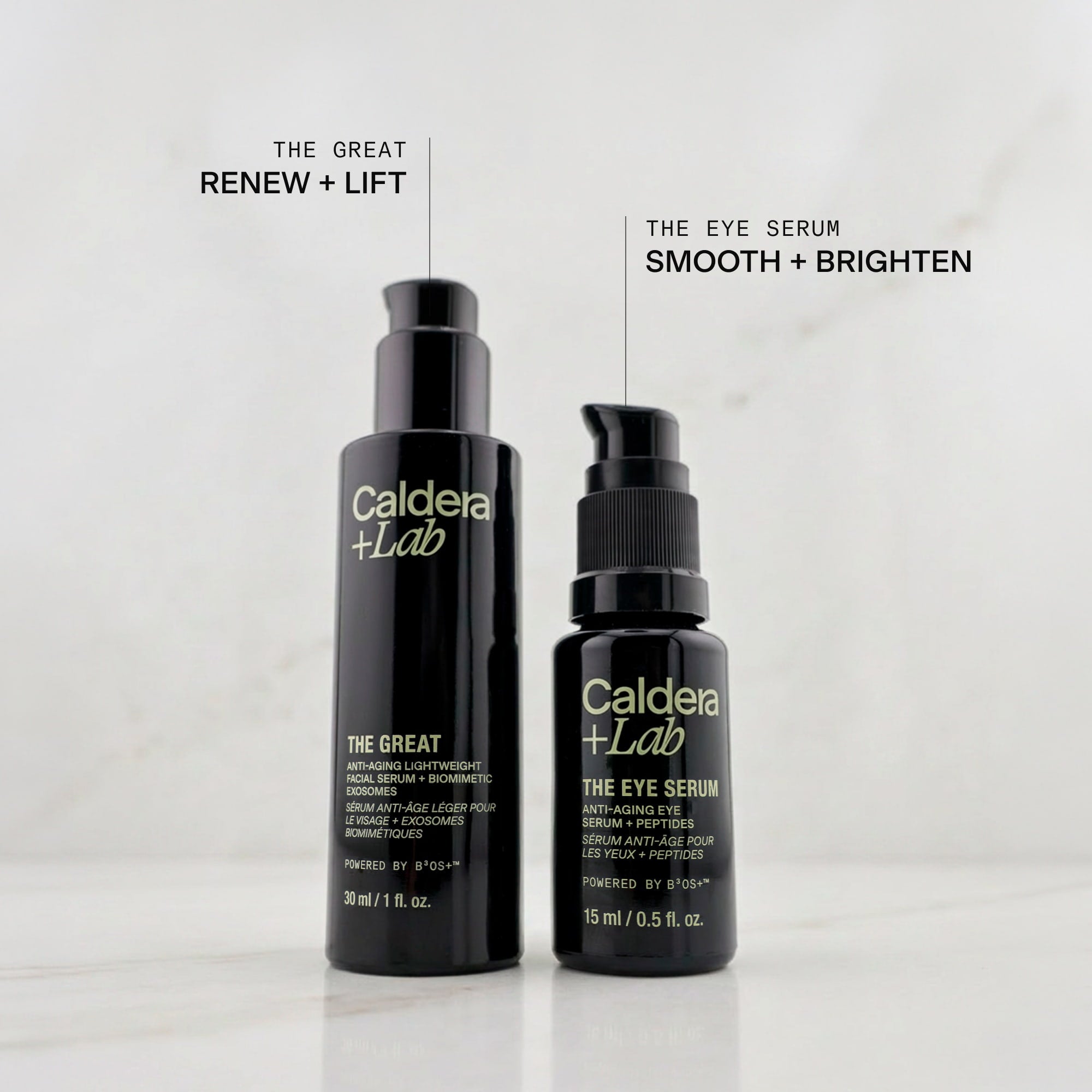 Two black bottles of Caldera + Lab skincare products on a light gray background