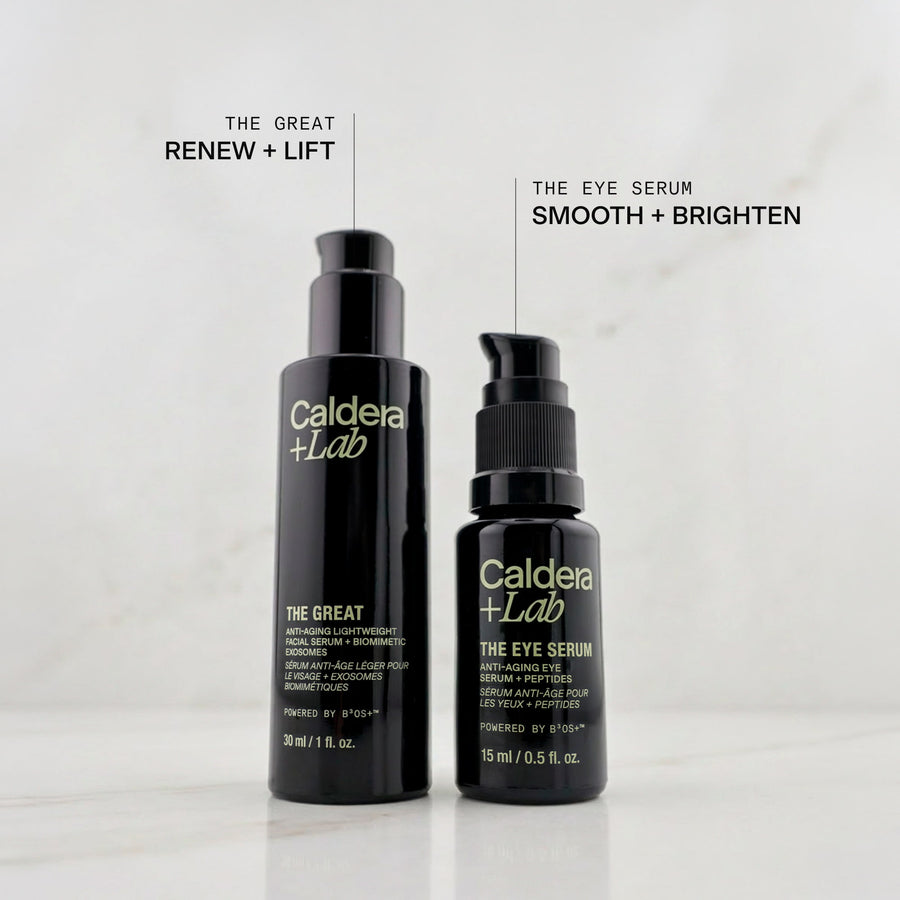 Two black bottles of Caldera + Lab skincare products on a light gray background